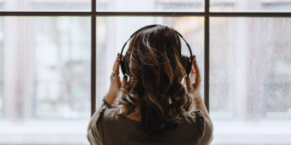 RPM_Lady listening to podcast in office